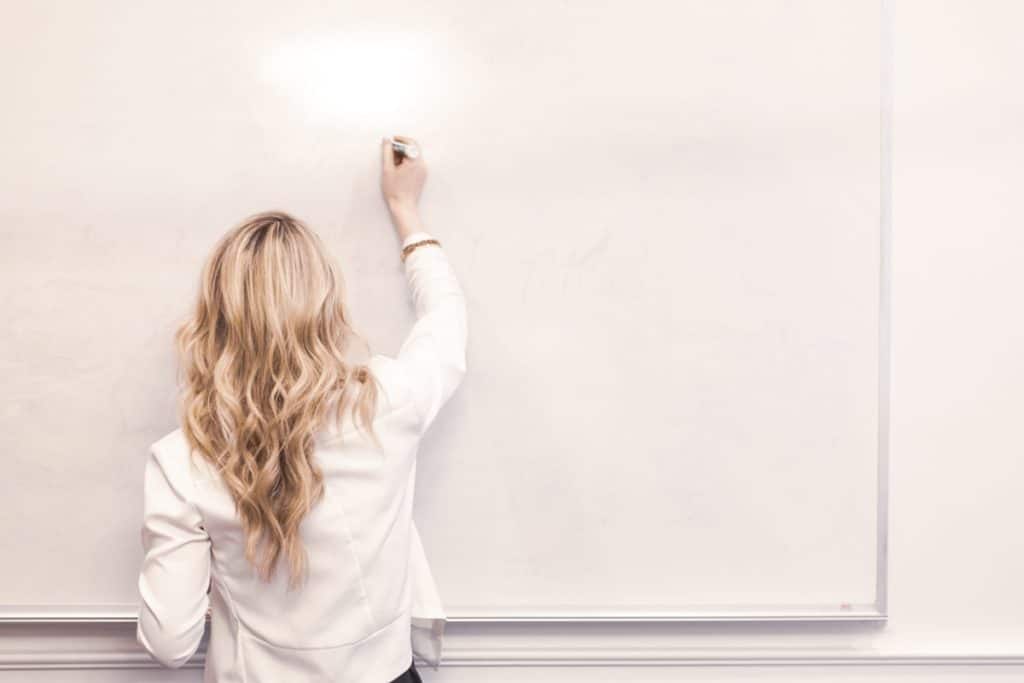 white board woman drawing