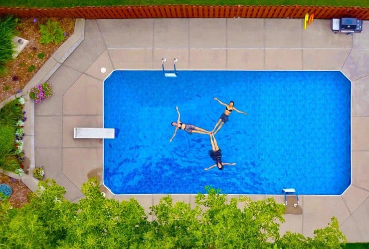 backyard pool swimmers